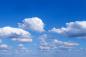 Preview: Selbstklebende Fensterfolie mit Wolken am Himmel
